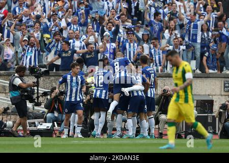 Mehdi Taremi of FC Porto celebrates with teammates after scoring during the Portugal Cup Final football match between FC Porto and CD Tondela at the Jamor National stadium in Oeiras, Portugal on May 22, 2022. (Photo by Pedro FiÃºza/NurPhoto) Stock Photo