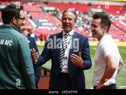 LONDON, ENGLAND - MAY 22: L-R Wrexham co-owner Ryan Reynolds, co- owner Robin Stanton-Gleaves and Wrexham owners Rob McElhenney during The Buildbase FA Trophy Final 2021/2022 between Bromley and Wrexham at Wembley Stadium , London, UK 22nd May , 2022 (Photo by Action Foto Sport/NurPhoto) Stock Photo