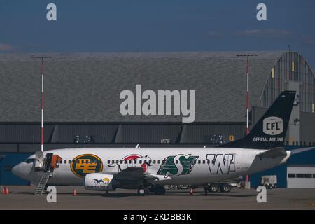 Canadian North plane with CFL clubs logos seen at Edmonton International Airport. On Sunday, May 22, 2022, in Edmonton International Airport, Edmonton, Alberta, Canada. (Photo by Artur Widak/NurPhoto) Stock Photo