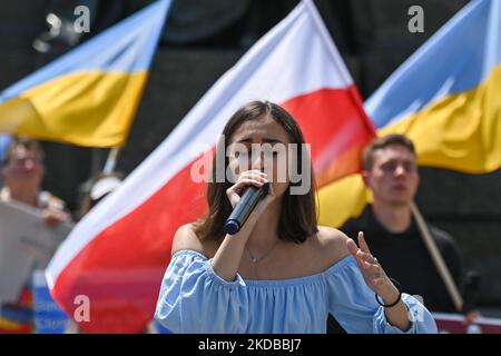 Members of the local Ukrainian diaspora, war refugges, peace activists, volunteers and local supporters during the 'Support Ukraine' at the Adam Mickiewicz monument in the Main Square in Krakow. On Thursday, June 02, 2022, in Krakow, Poland. (Photo by Artur Widak/NurPhoto) Stock Photo