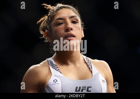 Silvana Gomez Juarez of Argentina enters the octagon to battle with Liang Na of China in the women’s strawweight bout during the UFC 275 event at Singapore Indoor Stadium on June 12, 2022 in Singapore. (Photo by Suhaimi Abdullah/NurPhoto) Stock Photo