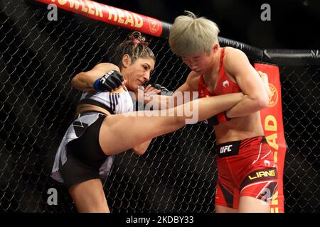 Silvana Gomez Juarez of Argentina (L) battles Liang Na of China in the women’s strawweight bout during the UFC 275 event at Singapore Indoor Stadium on June 12, 2022 in Singapore. (Photo by Suhaimi Abdullah/NurPhoto) Stock Photo