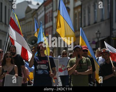 Members of the local Ukrainian diaspora, war refugees, peace activists, volunteers and local supporters during the 109th day of the 'Protest Nato Close The Sky' in Krakow. On Sunday, June 12, 2022, in Krakow, Poland. (Photo by Artur Widak/NurPhoto) Stock Photo