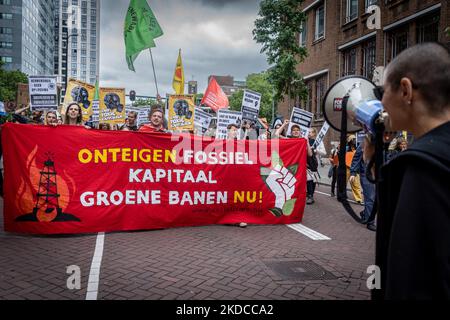 Climate protesters marching through the city of Rotterdam, Netherlands, on June 19, 2022. (Photo by Oscar Brak/NurPhoto) Stock Photo