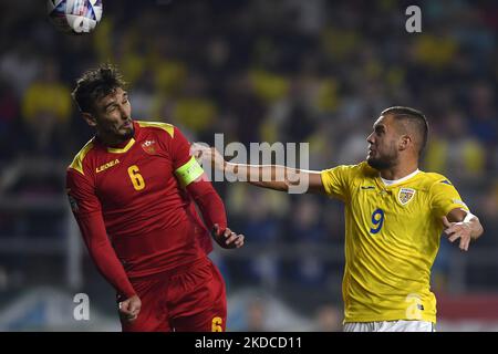 Zarko Tomasevic and George Puscas in action during the UEFA Nations League -League B Group 3 match between Romania and Montenegro at Rapid Giulesti Stadium on June 14, 2022 in Bucharest, Romania. (Photo by Alex Nicodim/NurPhoto) Stock Photo