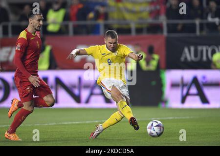 George Puscas and Zarko Tomasevic in action during the UEFA Nations League -League B Group 3 match between Romania and Montenegro at Rapid Giulesti Stadium on June 14, 2022 in Bucharest, Romania. (Photo by Alex Nicodim/NurPhoto) Stock Photo