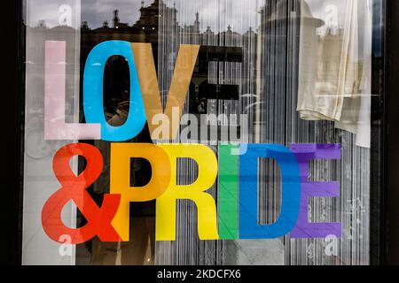 LOVE & PRIDE letters in rainbow colours are seen in a window of ZARA store in Krakow, Poland. June 21, 2022. The month of June is celebrated as the Pride Month around the world commemorating the struggles and victories of the LGBTQ+ communities. (Photo by Beata Zawrzel/NurPhoto) Stock Photo