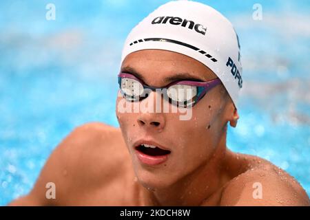 David Popovici of Team Romania prepares to compete in the Men's 100m Freestyle Final on day five of the Budapest 2022 FINA World Championships at Duna Arena on June 22, 2022 in Budapest, Hungary. (Photo by Alex Nicodim/NurPhoto) Stock Photo