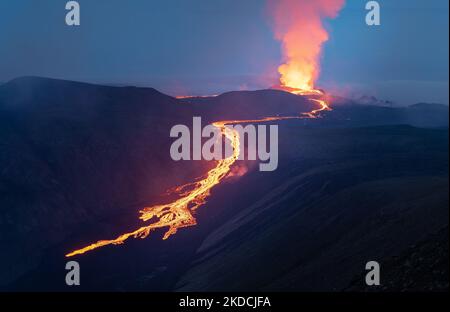 A scenic aerial shot of the erupting Fagradalsfjall volcano in Iceland in the evening Stock Photo