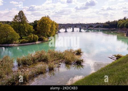 Peschiera del Garda, Verona, Italy - 22 September 2022 View from Bastion San Marco to River Mincio and ferry bridge at Peschiera, Lago del Garda Stock Photo