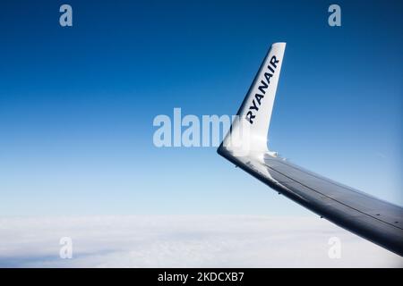 Ryanair logo is seen on a wing of the Boening 737 airplane during the flight to Madrid, Spain on June 27, 2022. (Photo by Jakub Porzycki/NurPhoto) Stock Photo