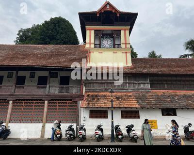 Methan Mani clock tower near the historic Sree Padmanabhaswamy Temple in Thiruvananthapuram (Trivandrum), Kerala, India, on May 12, 2022. The Methan Mani clock was installed in 1840's and was constructed with a highly complex pulley system. The clock has a unique appearance. Above the dial is the face of a bearded man with two rams on the side of his cheeks. When the clock strikes, the rams hit against the cheeks of the man. It have been installed in the 1840s during the reign of Maharaja Swathi Thirunal Rama Varma. (Photo by Creative Touch Imaging Ltd./NurPhoto) Stock Photo