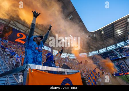 FC Cincinnati fans celebrate after a goal during a Major League Soccer match between FC Cincinnati and New York FC that ended in a 4-4 tie at TQL Stadium in Cincinnati, Ohio. Wednesday, June 29, 2022. (Photo by Jason Whitman/NurPhoto) Stock Photo