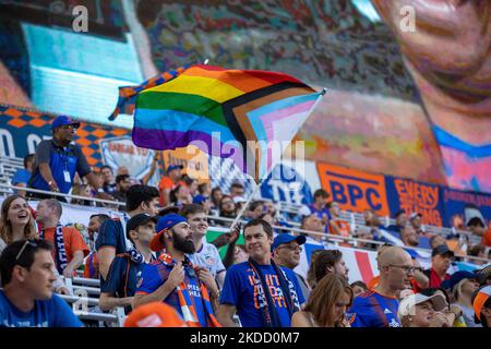 FC Cincinnati fans celebrate after a goal during a Major League Soccer match between FC Cincinnati and New York FC that ended in a 4-4 tie at TQL Stadium in Cincinnati, Ohio. Wednesday, June 29, 2022. (Photo by Jason Whitman/NurPhoto) Stock Photo