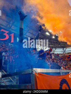 FC Cincinnati fans celebrate after a goal during a Major League Soccer match between FC Cincinnati and New York FC that ended in a 4-4 tie at TQL Stadium in Cincinnati, Ohio. Wednesday, June 29, 2022. (Photo by Jason Whitman/NurPhoto) Stock Photo