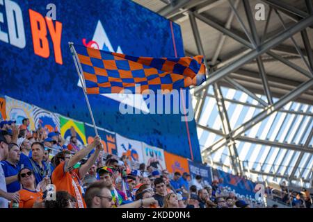 FC Cincinnati fans celebrate after a goal during a Major League Soccer match between FC Cincinnati and New York FC that ended in a 4-4 tie at TQL Stadium in Cincinnati, Ohio. Wednesday, June 29, 2022. (Photo by Jason Whitman/NurPhoto) Stock Photo