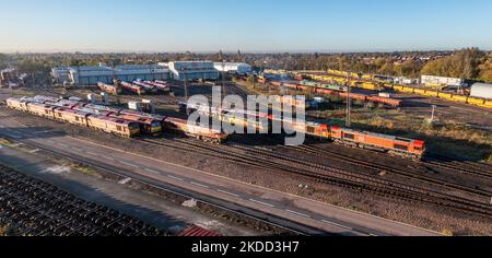 TOTON, NOTTINGHAM, UK - NOVEMBER 4, 2022.  An aerial view of DB Schenker's Toton TMD with railway locomotive and wagons ready for repair and fueling Stock Photo