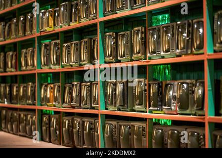 Old retro CRT TVs all over the wall Stock Photo