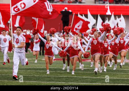 Bloomington, United States. 05th Nov, 2022. Indiana University cheerleaders run onto the field before an NCAA football game against Penn State at Memorial Stadium. The Nittany Lions beat the Hoosiers 45-14. Credit: SOPA Images Limited/Alamy Live News Stock Photo