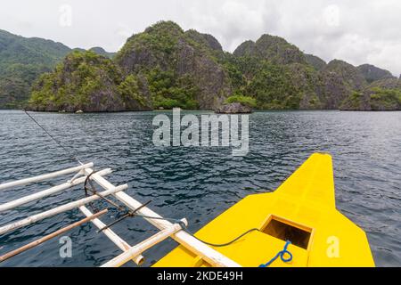 On a motorized outrigger boat heading to an island in northern Palawan, Philippines Stock Photo