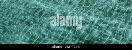 Abstract background Patterns Ripped water Surface swimming pool Light Reflection Vibrant blue green Stock Photo