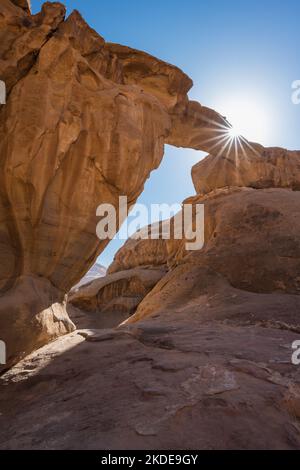 Um Frouth Rock Arch in Wadi Rum, a Natural Bridge in Jordan, also called Jabal Umm Fruth Stock Photo