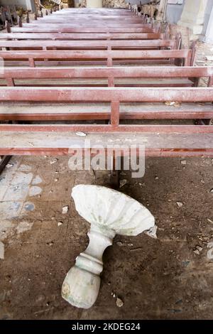 Marble baptismal font that fell after the earthquake of October 2013 at the Loboc Church in Bohol, Philippines Stock Photo