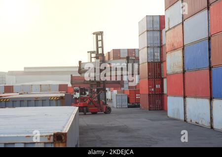 Container handling crane for industrial cargo loading and unloading container Stock Photo