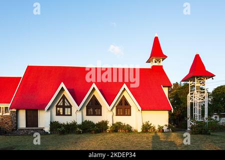 Red-roofed church Notre Dame Auxiliatrice at Cap Malheureux, Riviere du Rempart district, Mauritius Stock Photo