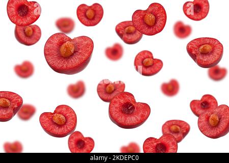 Falling cherry slice isolated on white background, selective focus Stock Photo