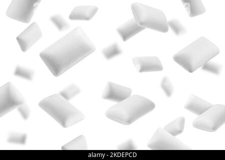 Falling chewing gum isolated on white background, selective focus Stock Photo