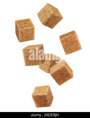 Falling Brown cane sugar cubes isolated on white background, clipping path, full depth of field Stock Photo