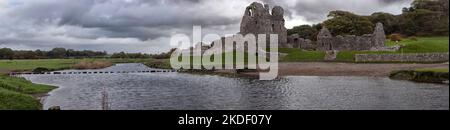 A view of Ogmore Castle,near Bridgend South Wales, taken from across the river Ogmore. Stock Photo