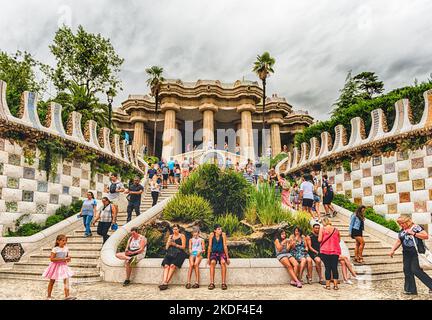 BARCELONA - AUGUST 9: Main entrance and staircase of Park Guell in Barcelona, Catalonia, Spain, on August 9, 2017. Designed by Antoni Gaudi, the park Stock Photo