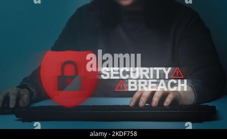 Woman using computer with VR warning interface of security breach. Cyber security data protection business technology. Stock Photo