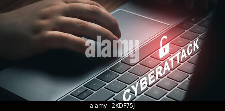 Woman using laptop with digital warning pop up of cyberattack. Cyber crime concept. Cyber security data protection business technology. Stock Photo