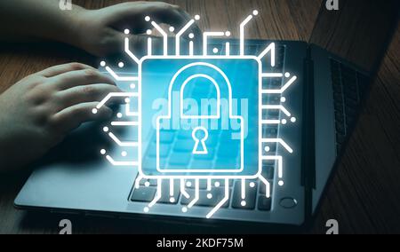 Cyber security network concept. Background of hands typing on laptop with flare light effect and security lock graphic. Digital Data Protection. Stock Photo