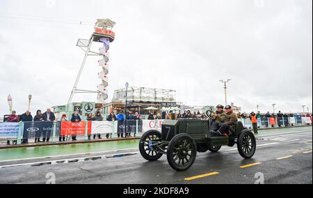 Brighton UK 6th November 2022 - Cars arrive on Brighton seafront on a wet and windy day after taking part in the annual RM Sotheby's London to Brighton Veteran Car Run today . The Run is open to four-wheeled cars, tri-cars and motor tricycles manufactured before 1st January 1905 : Credit Simon Dack / Alamy Live News Stock Photo