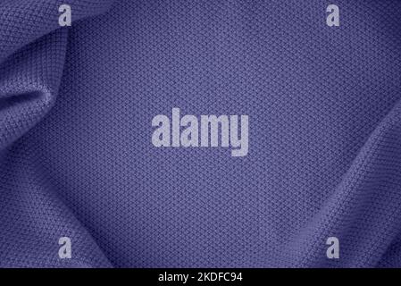 Texture of knitted fabric in trendy purple lavender color. Color of the year 2022. Stock Photo
