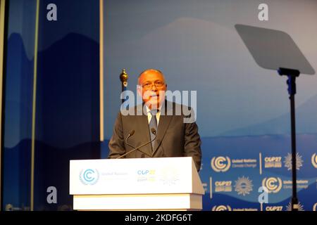 Sharm El Sheikh. 6th Nov, 2022. Sameh Shoukry, Egyptian Foreign Minister and President of the 27th Conference of the Parties of the United Nations Framework Convention on Climate Change (COP27), addresses the opening ceremony of the conference in Sharm El-Sheikh, Egypt, Nov. 6, 2022. The COP27 opened on Sunday in Egypt's coastal city of Sharm El-Sheikh in hopes to turn global climate finance pledges into action. Credit: Sui Xiankai/Xinhua/Alamy Live News Stock Photo