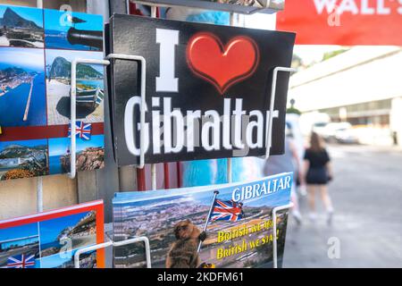 Main Street, Gibraltar. 22nd October 2022. Tourist souvenir postcards on display outside a gift shop in Main Street, Gibraltar. Stock Photo