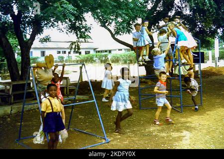 Children in the playground at the RAF Primary School on Burma Camp, Accra, Ghana, c.1959 Stock Photo