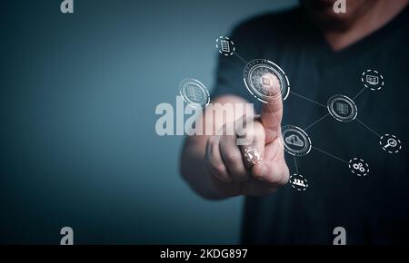 Young man pointing on Artificial Intelligence online system technology. Stock Photo