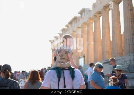 Young kid observing the parthenon Stock Photo