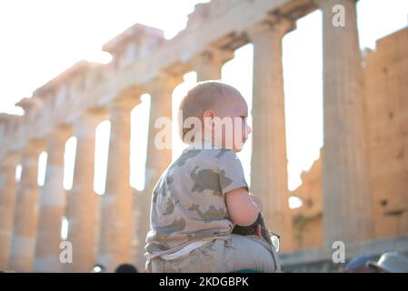 Young kid observing the parthenon Stock Photo