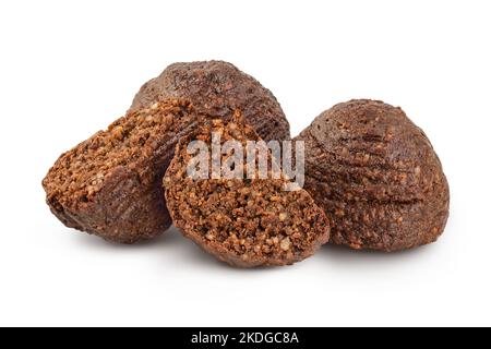 chocolate cookie with kerob, banana, cashew, sunflower seeds and coconut paste isolated on white background. Healthy food, gluten-free, flour-free Stock Photo