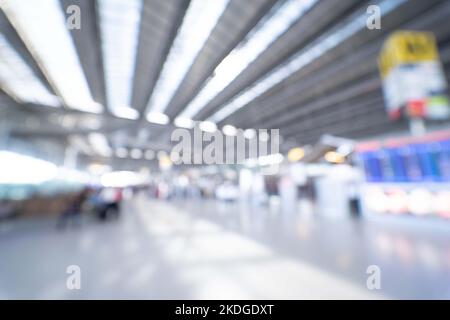 Blurred image of airport terminal background with bokeh light Stock Photo