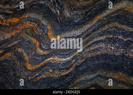 Rocky shapes on the beach. textures and patterns generated on the stones of the Asturian beaches.PLaya de Portizuelo en Asturias. Spain Stock Photo