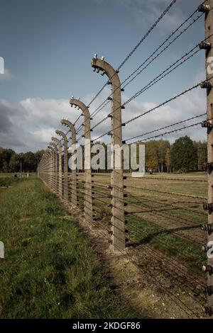 Auschwitz barbed wire electric Fence. Auschwitz Birkenau Concentration camp where to three million people were murdered by the Nazis Stock Photo