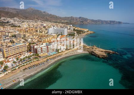 The drone aerial view of Nerja, Andalusia, Spain. Nerja is a municipality on the Costa del Sol in the province of Málaga. Stock Photo